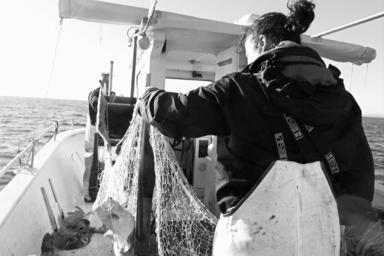 Captain Olga Capote and her husband Carlos Batle working together on the fishing boat Es Batlets off the coast of Alcúdia